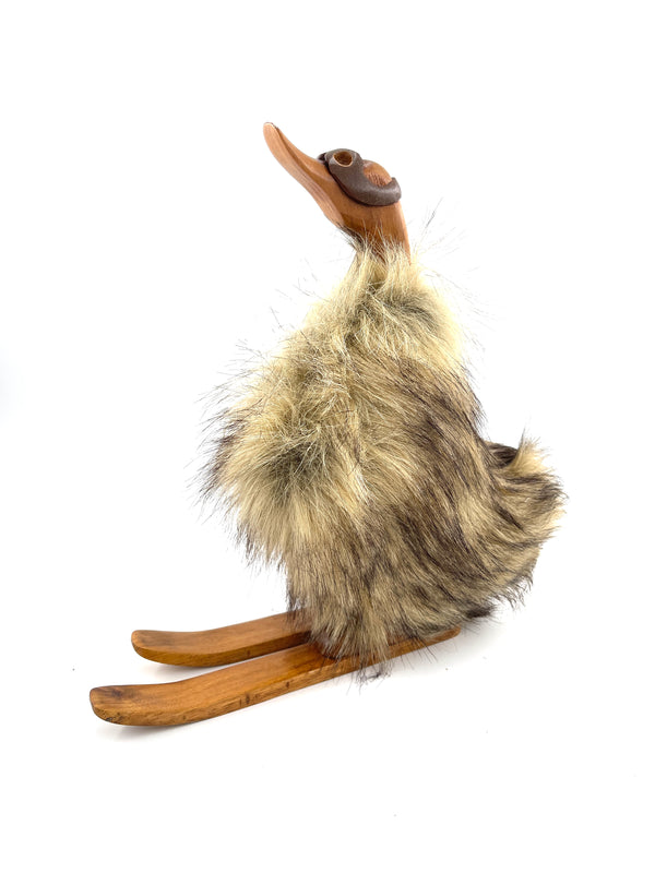 Decorative duck on skis made of wood and fur, brown 39cm