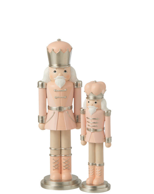 Adorable set of 2 and 4 polyresin nutcrackers in pink and white