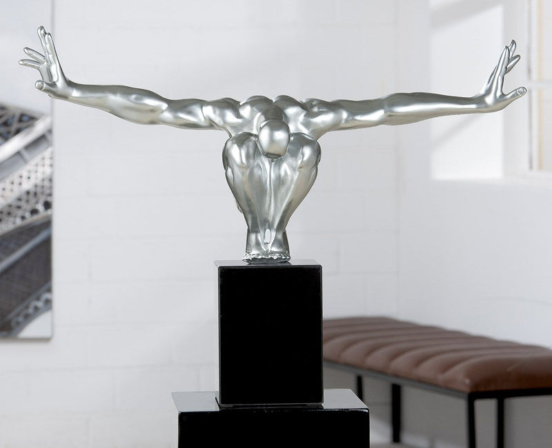 Impressive sculpture "Cliffhanger" in silver black made of synthetic resin and marble