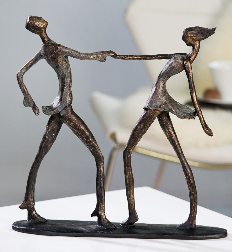 Bronzefarbene Skulptur Jive - Tanzendes Paar mit Spruchanhänger