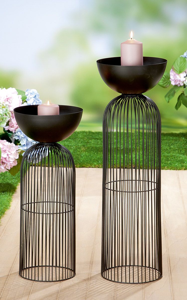 Bowl stand made of black metal with elegant grid design