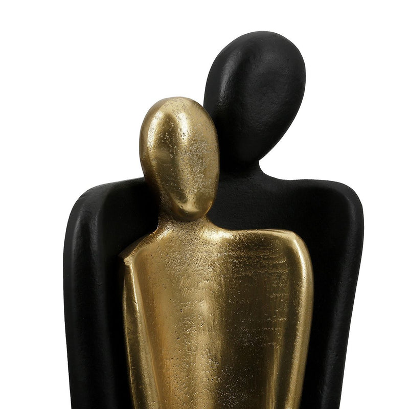 Sculpture couple in black and gold made of aluminum