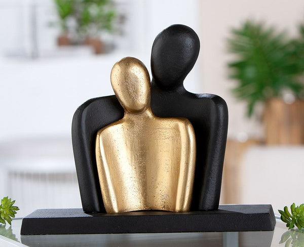 Sculpture couple in black and gold made of aluminum