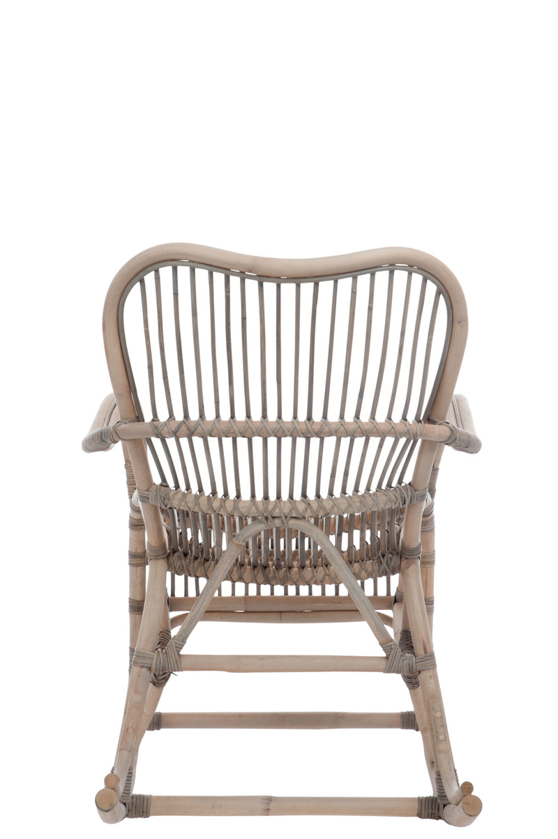 Relax in the luxurious gray rattan rocking chair