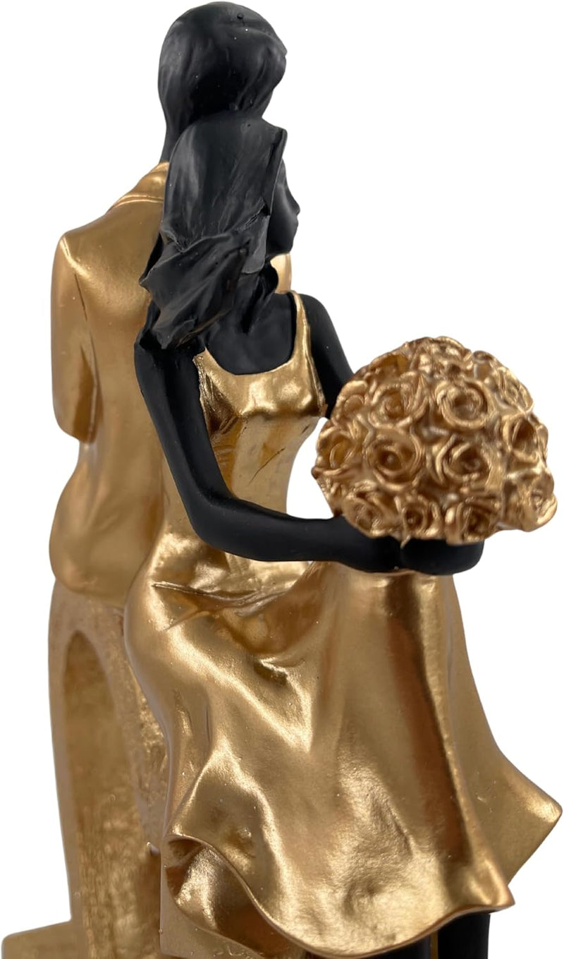 Elegante Skulptur eines sitzenden Paares in Herzform, Schwarz und Gold