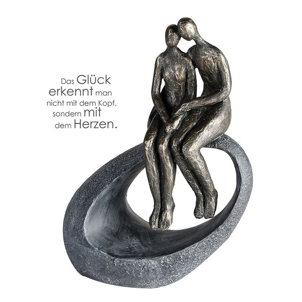 Polysculptuur Moment in bronskleuren - Een symbolisch koppel op een grijze ovale basis