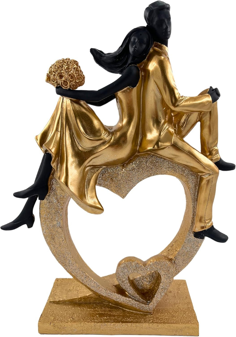 Elegante Skulptur eines sitzenden Paares in Herzform, Schwarz und Gold