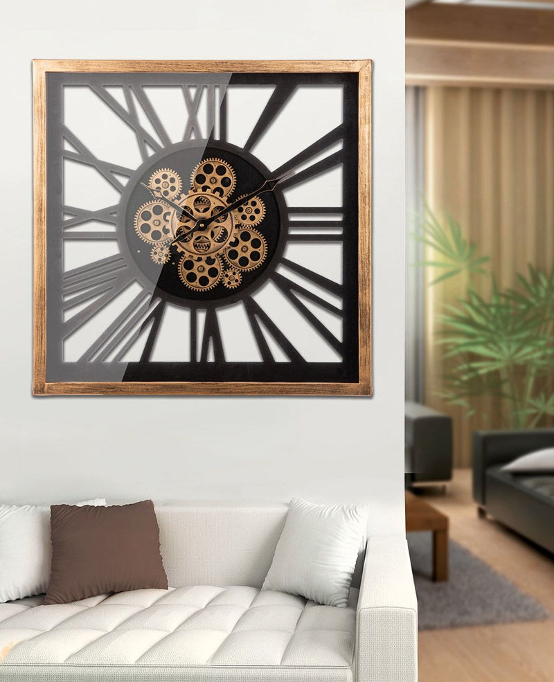 Modern wall clock 'Dente' with moving gears - a geometric work of art 