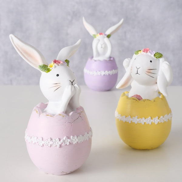 Handmade Easter bunny figure Easy with flower wreath in colorful eggshell