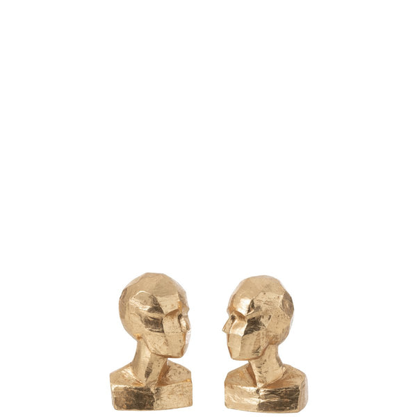 Geometric bookend heads in gold