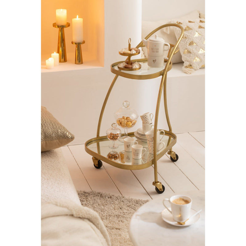 Elegant triangular service trolley made of metal in mirror gold