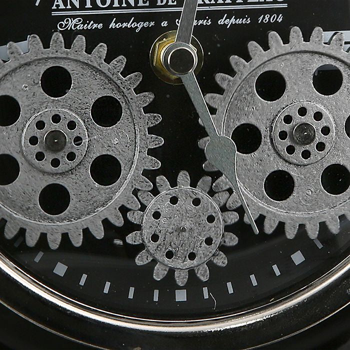 Table clock transmission with moving gears